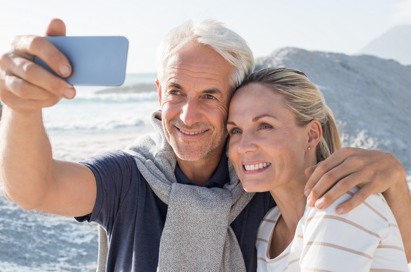 Social Media Advertising Senior Couple taking selfie - social media advertising